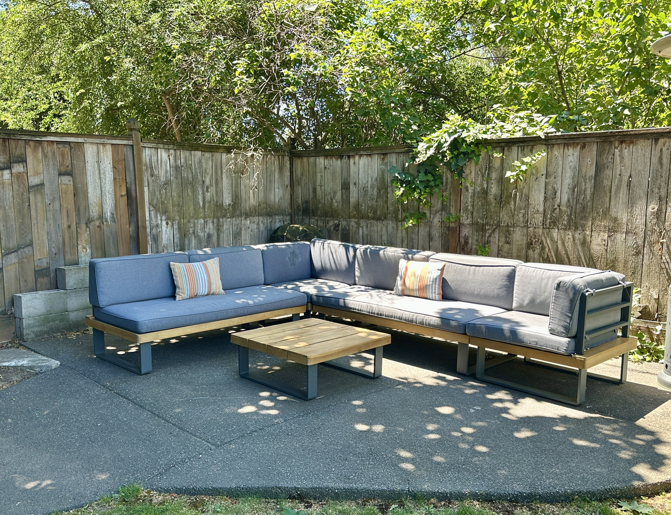 Relax on the lounger in the shaded back yard!