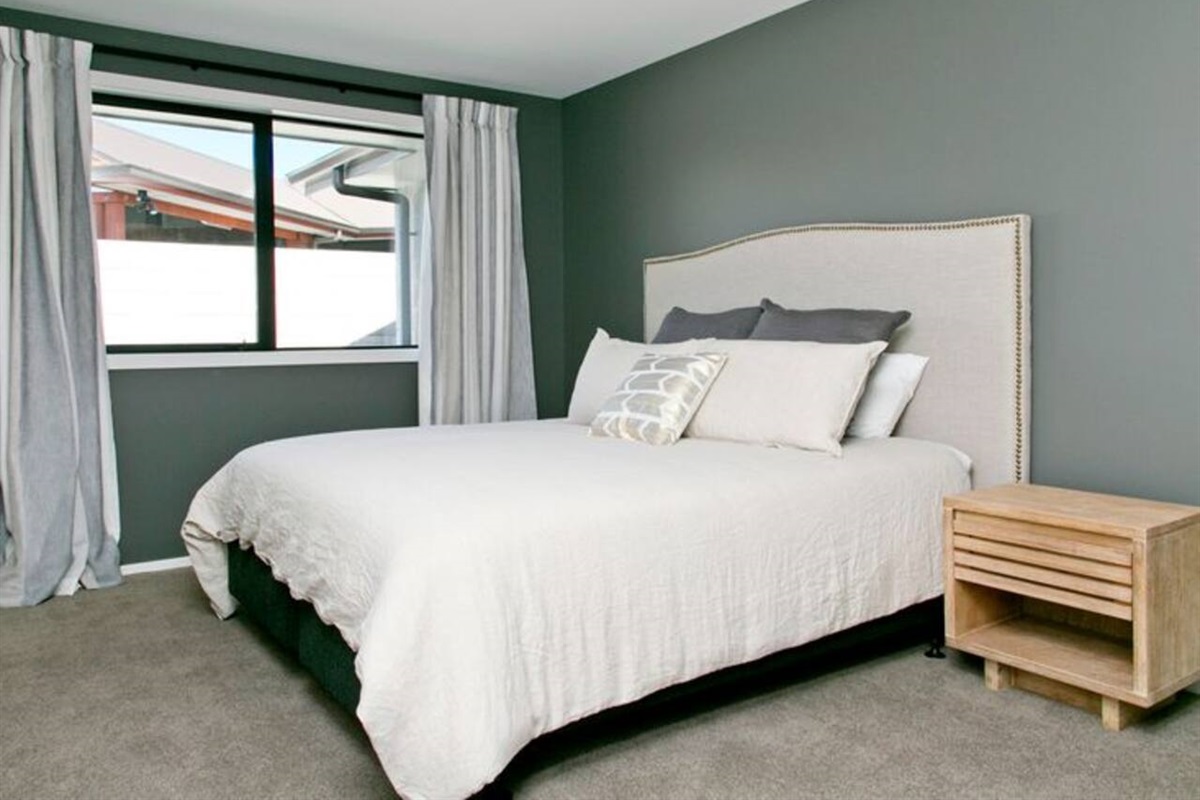 Main Bedroom 1 with Ensuite and TV on wall for bedtime Netflix or lazy mornings.