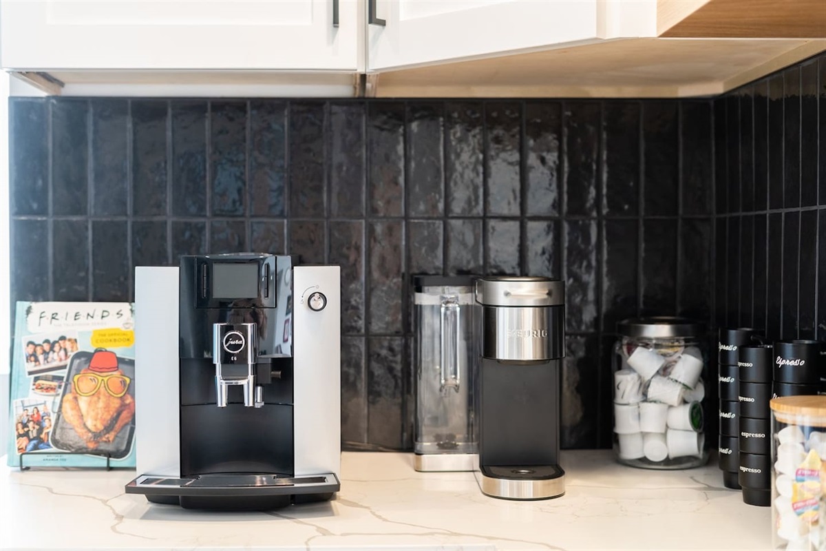 Enjoy a relaxing moment in the dedicated coffee area, complete with its own seating and a coffee machine for your morning routine.