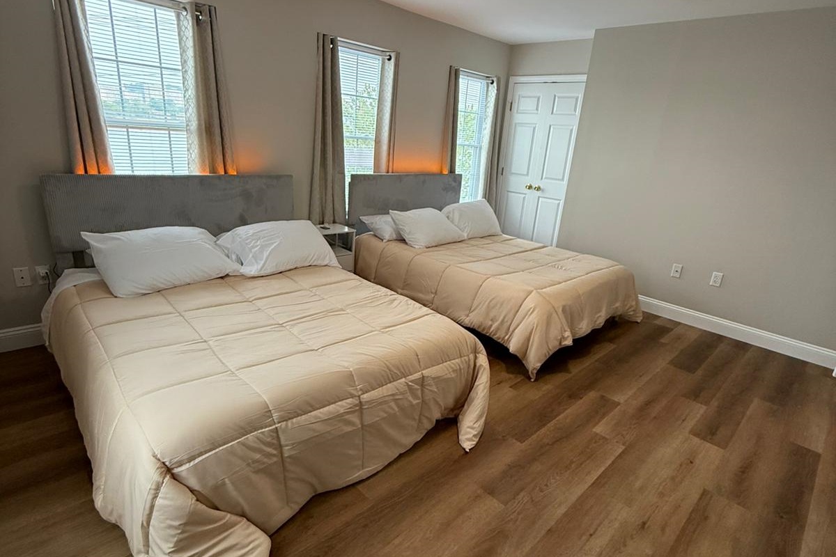 Bedroom #3 with LED lights on beds lit