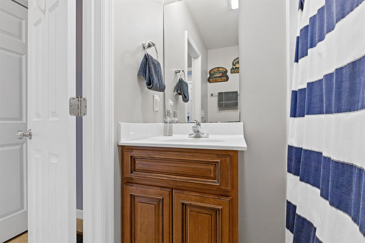 Clean and simple 1st floor bathroom setup with everything you need