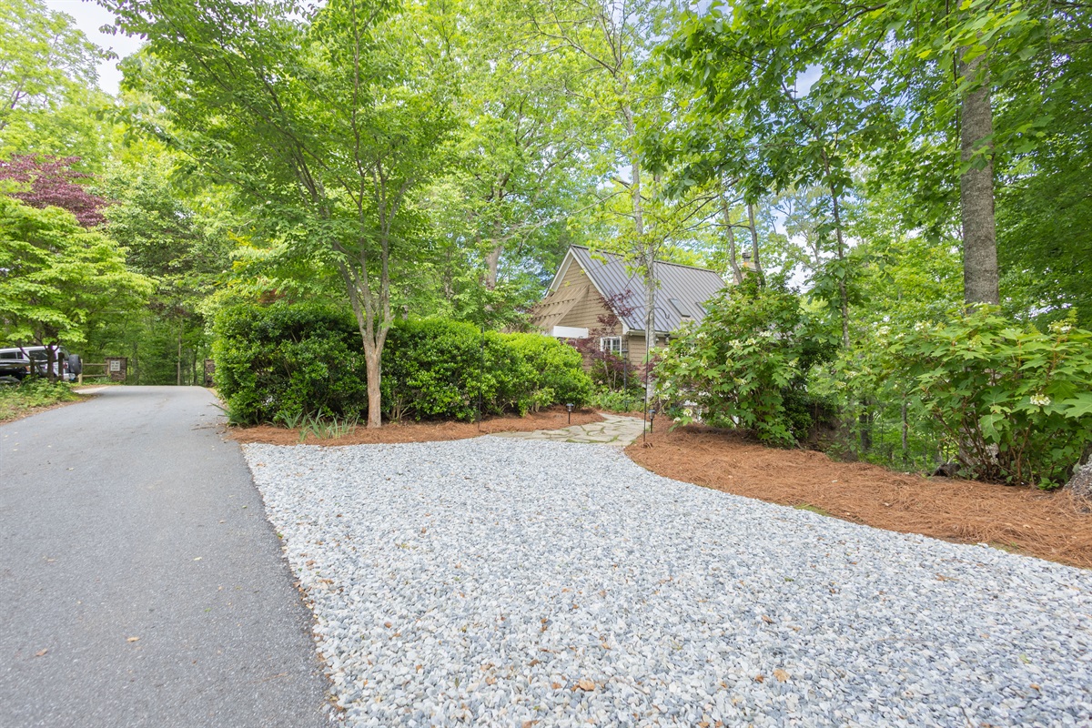 Plenty of gravel parking is available, making it easy for guests to spread out and access the home comfortably.