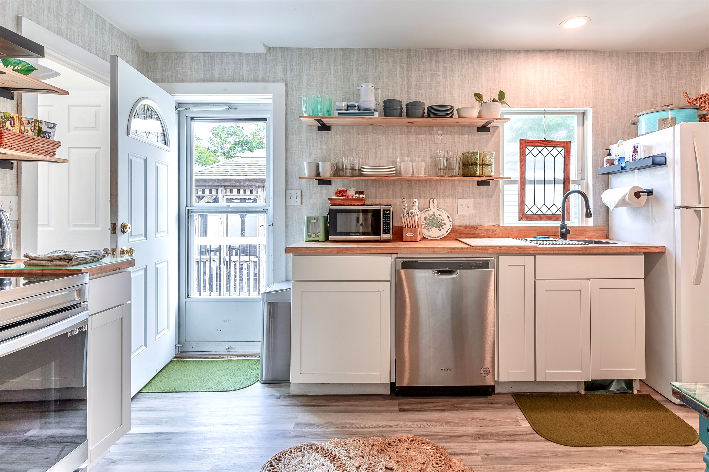Full kitchen when you want to cook at home with back door access to the deck