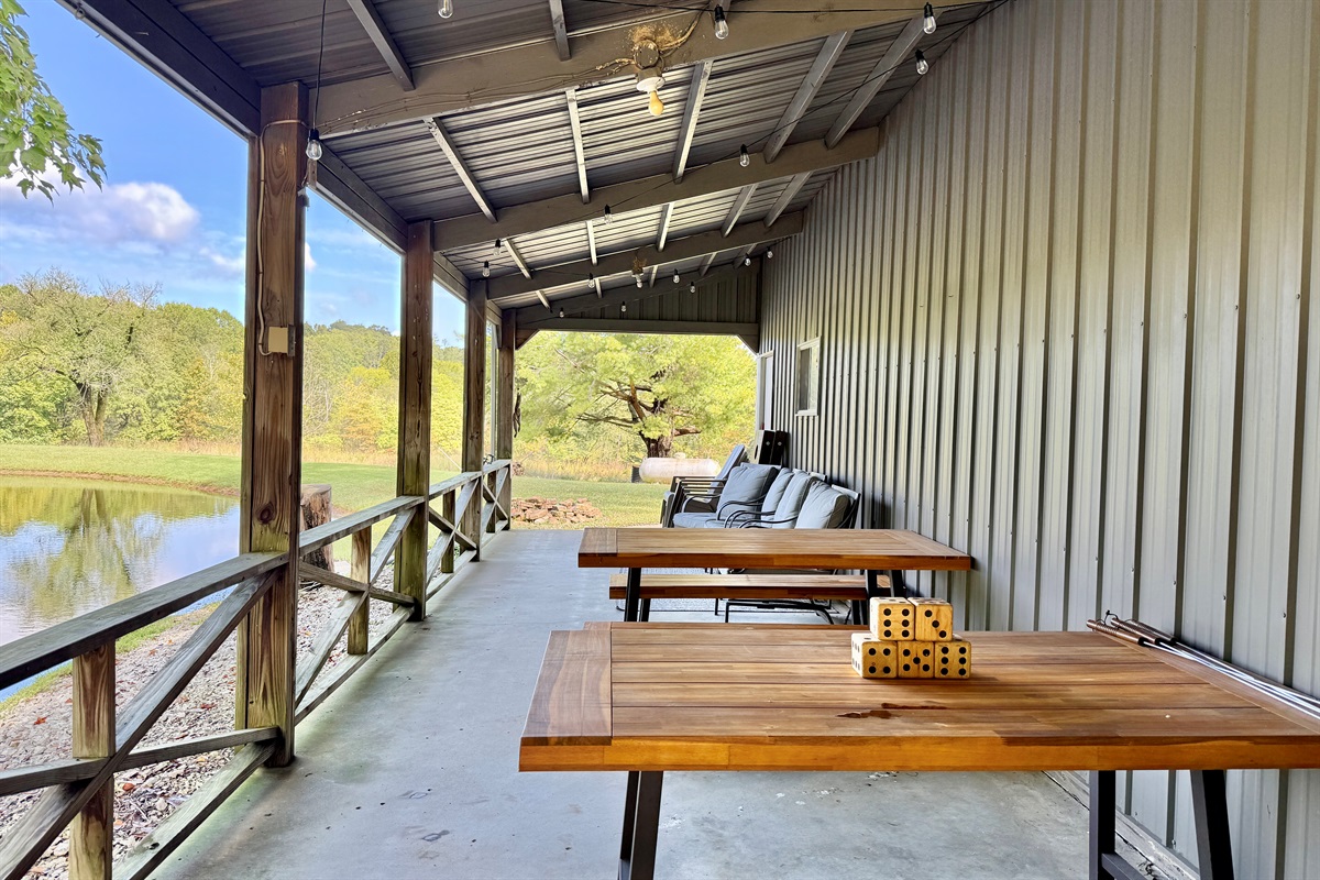 Covered deck overlooking pond