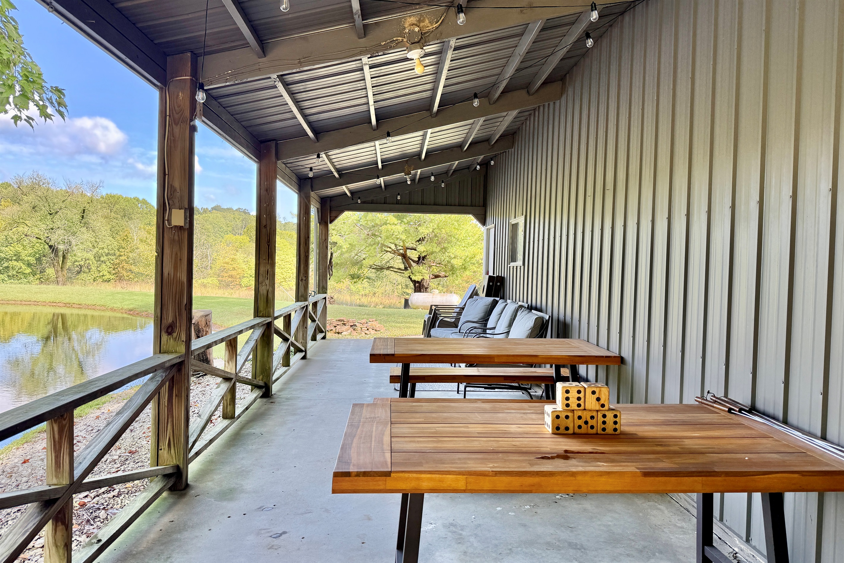 Covered deck overlooking pond