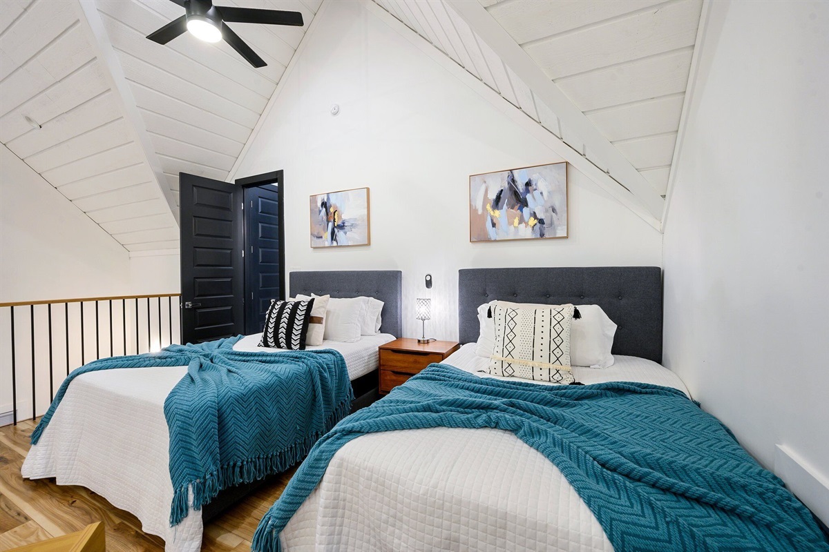 Game room by day, cozy sleeping space by night