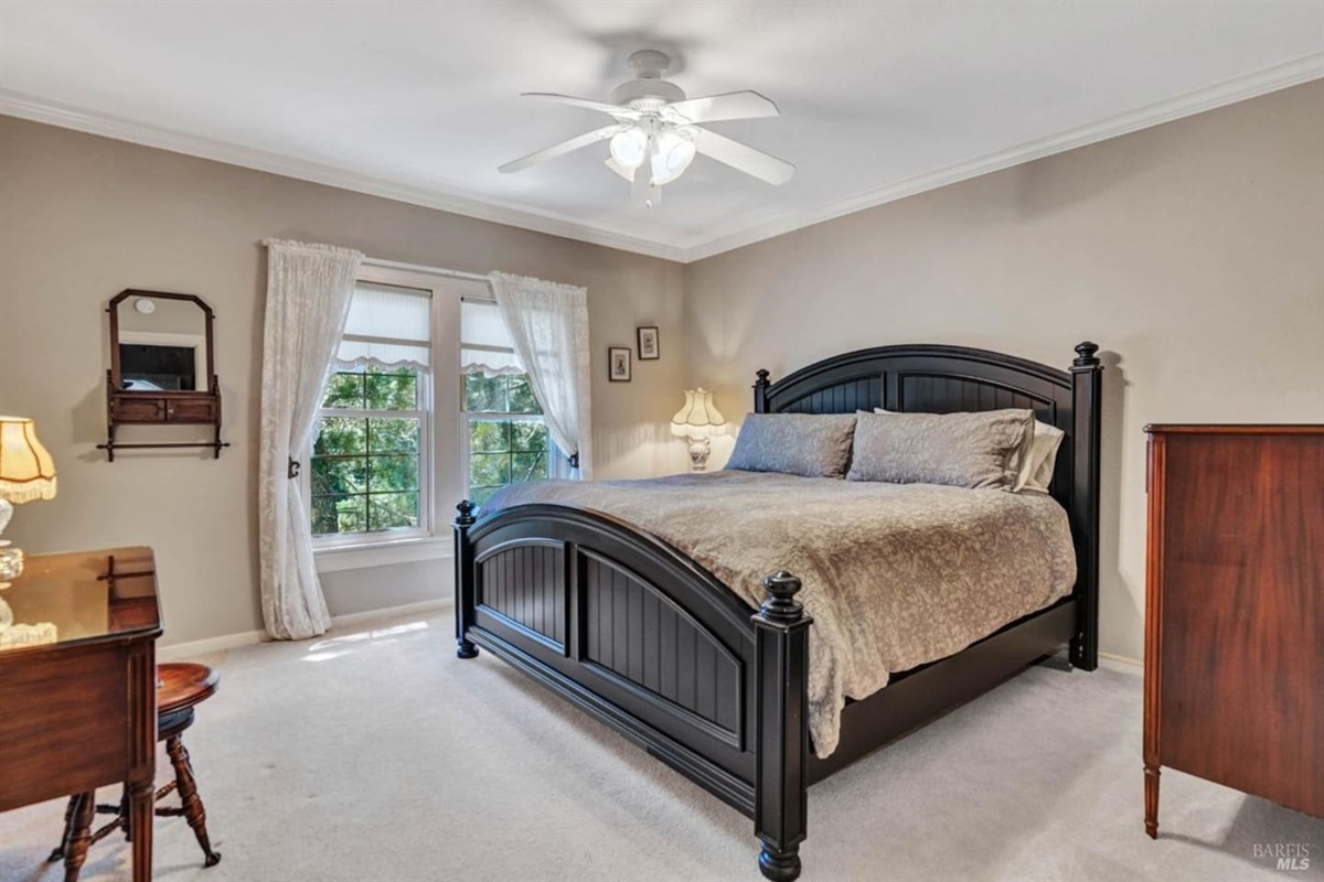 Third bedroom on second floor, king bed.