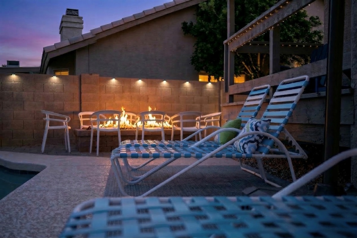 Large fire pit in the backyard is the perfect gathering spot in the evening.
