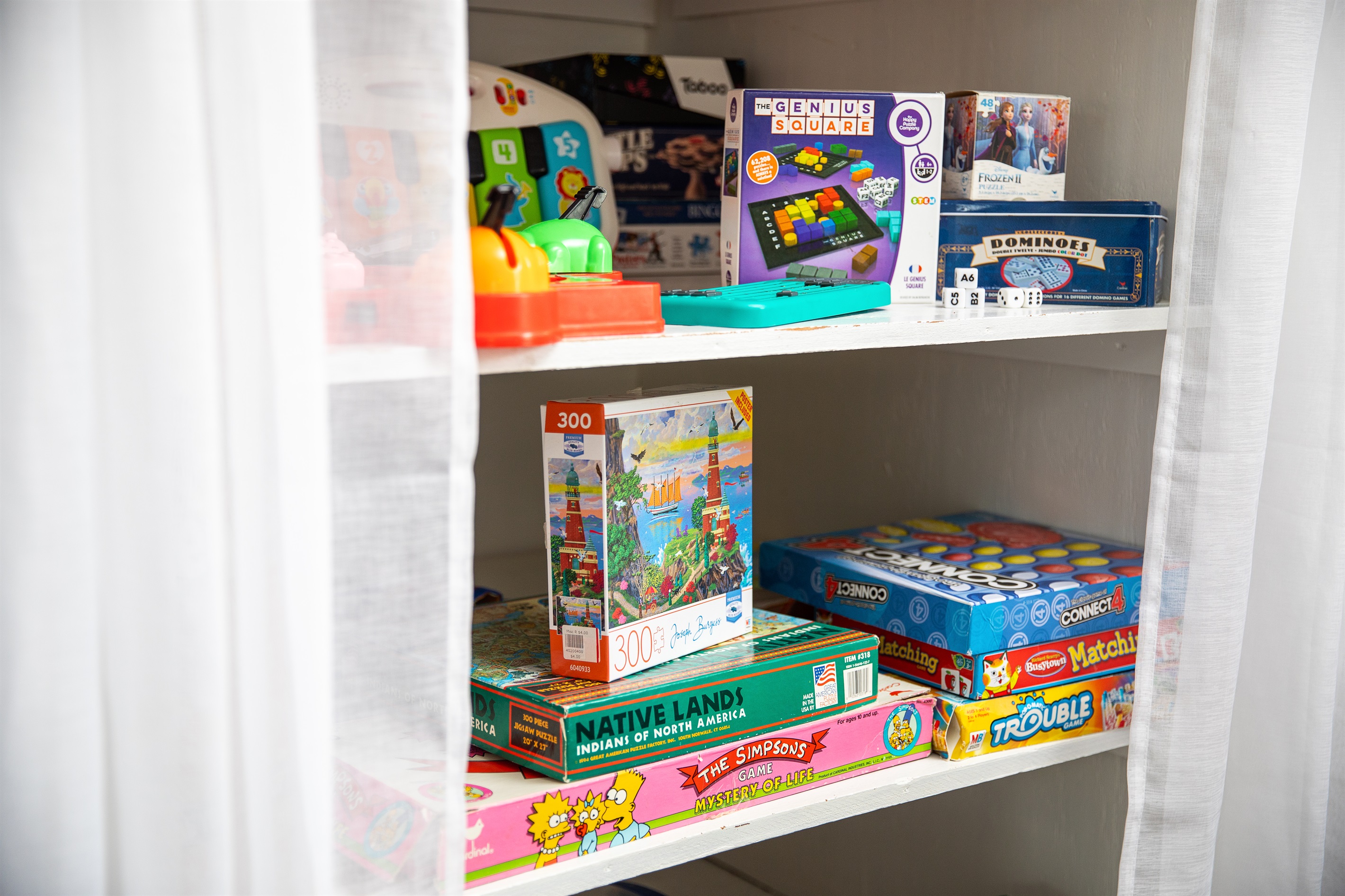 Keep kids happily occupied with a full collection of games and toys while adults relax nearby.