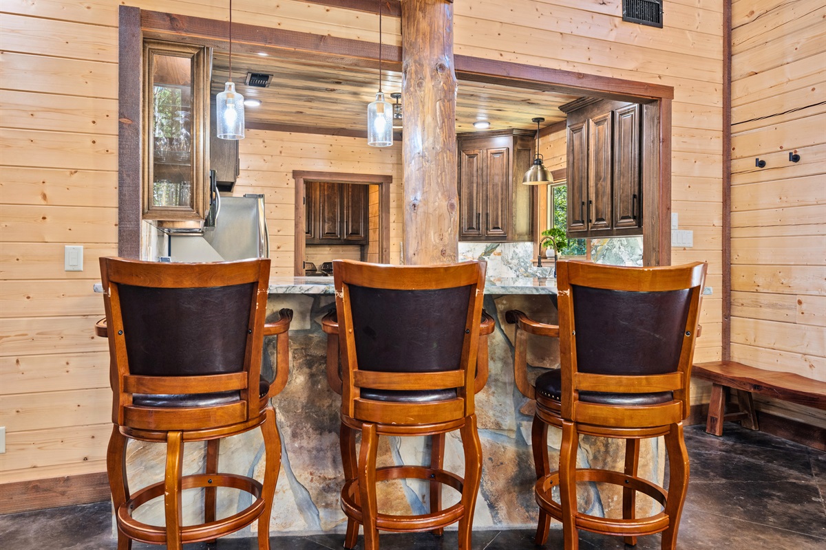 Kitchen bar seating for casual dining and conversation.