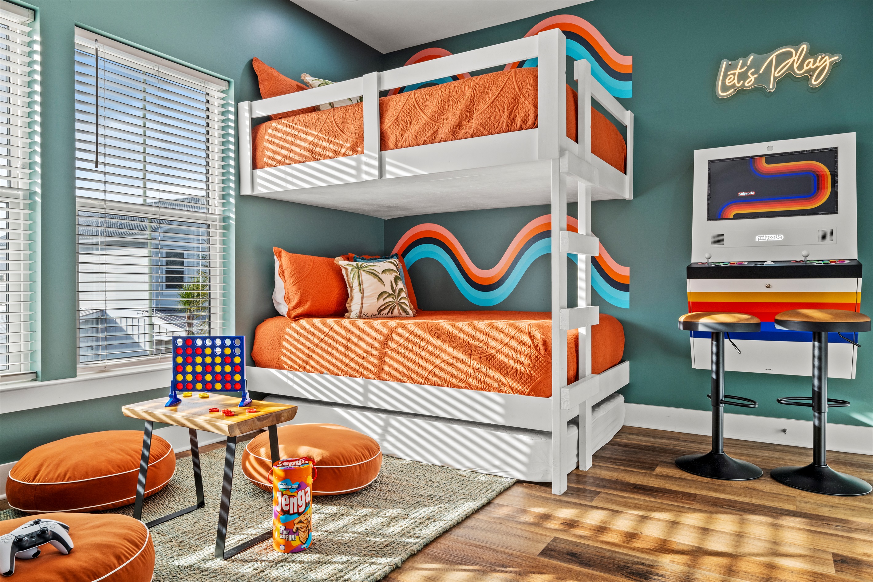The ultimate kids bunk room. Built in bunks, arcade games, and space to play make this a favorite hangout for little guests after a beach day.