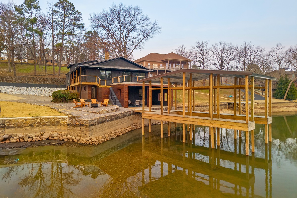 The private dock and surrounding outdoor spaces show how perfectly this home is designed for enjoying lake life.
