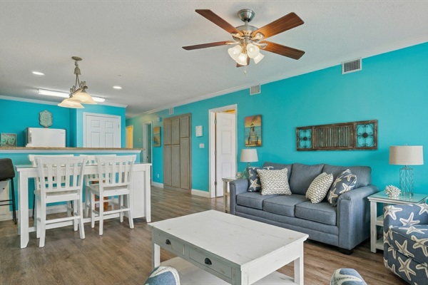 Large living room with sleeper sofa, smart TV, dining area and a convenient ground floor patio.