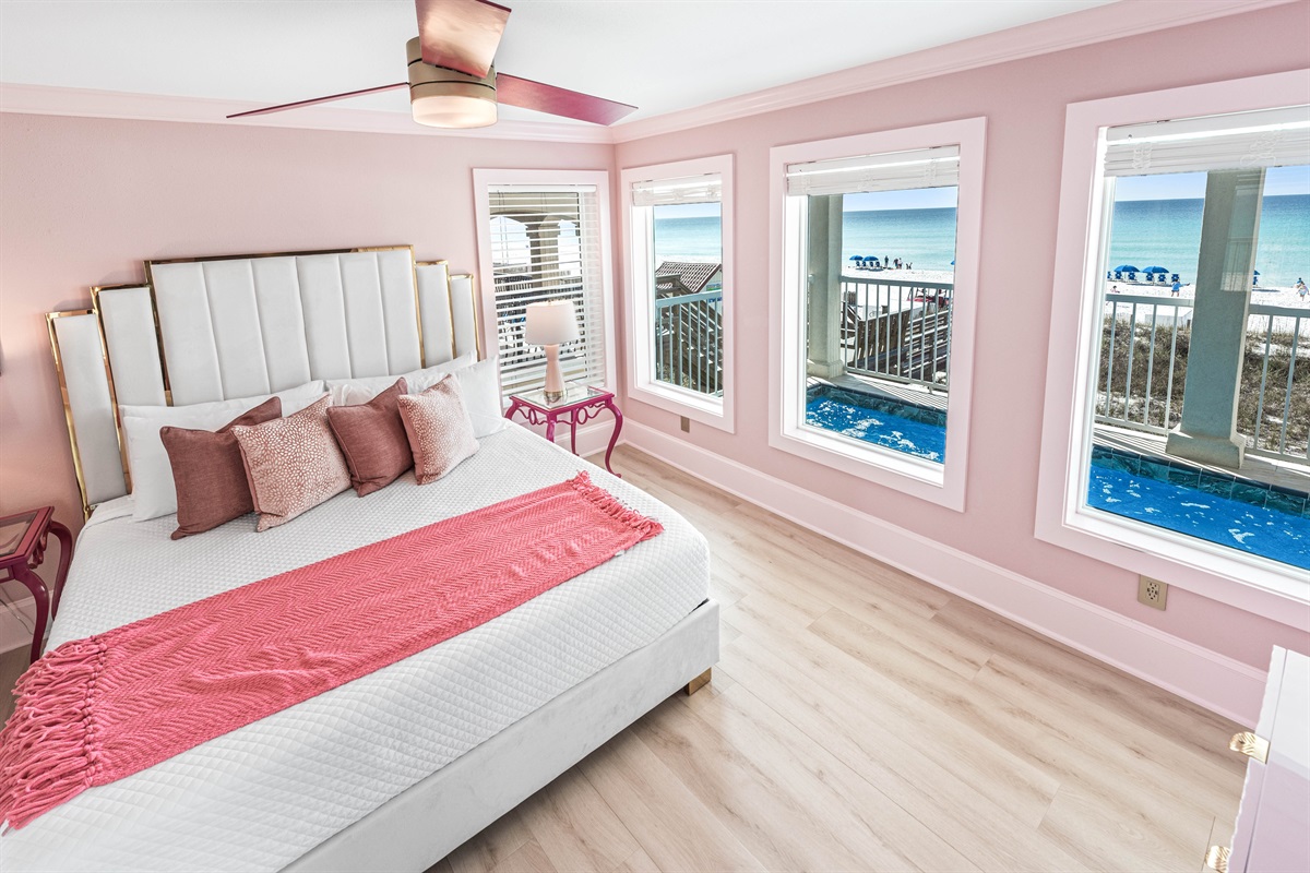 Beachfront Views & King Bed Comfort: Relax with a 65" Smart TV and a newly remodeled ensuite bathroom featuring a soaker tub and separate walk-in shower. This first-floor suite offers easy access to the private pool and beach.