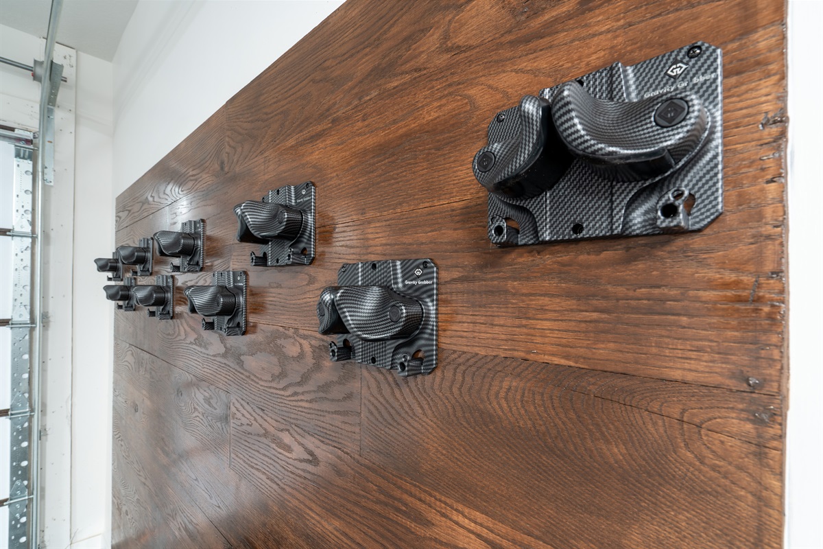 Wall-mounted ski and snowboard storage keeps gear secure and out of the way.