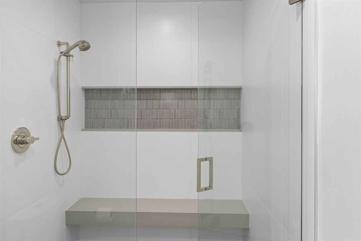 Walk-in shower with a bench
