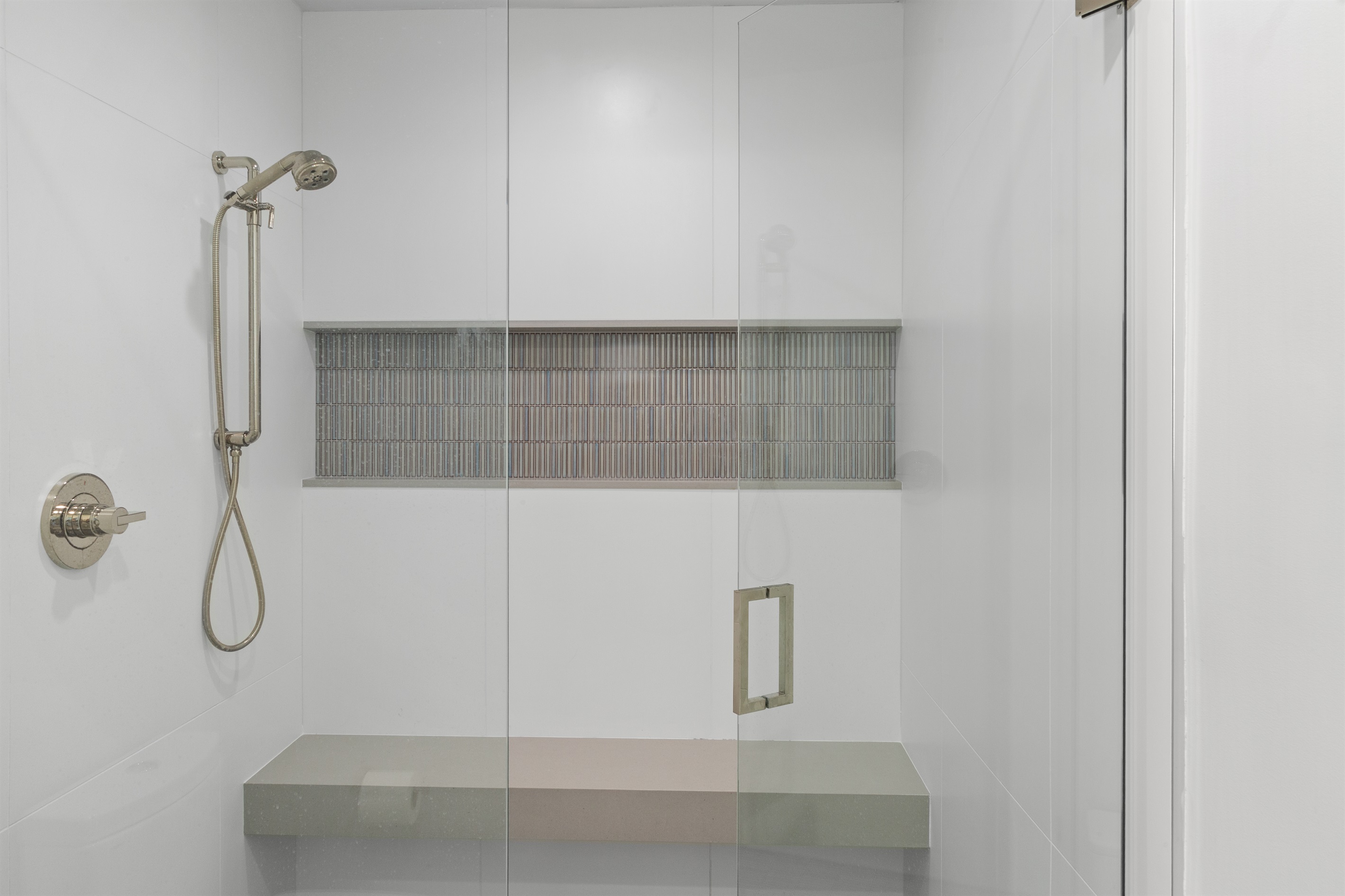 Walk-in shower with a bench