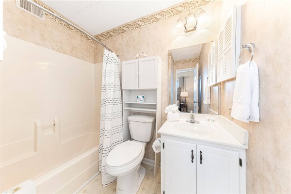Primary bathroom with shower and tub