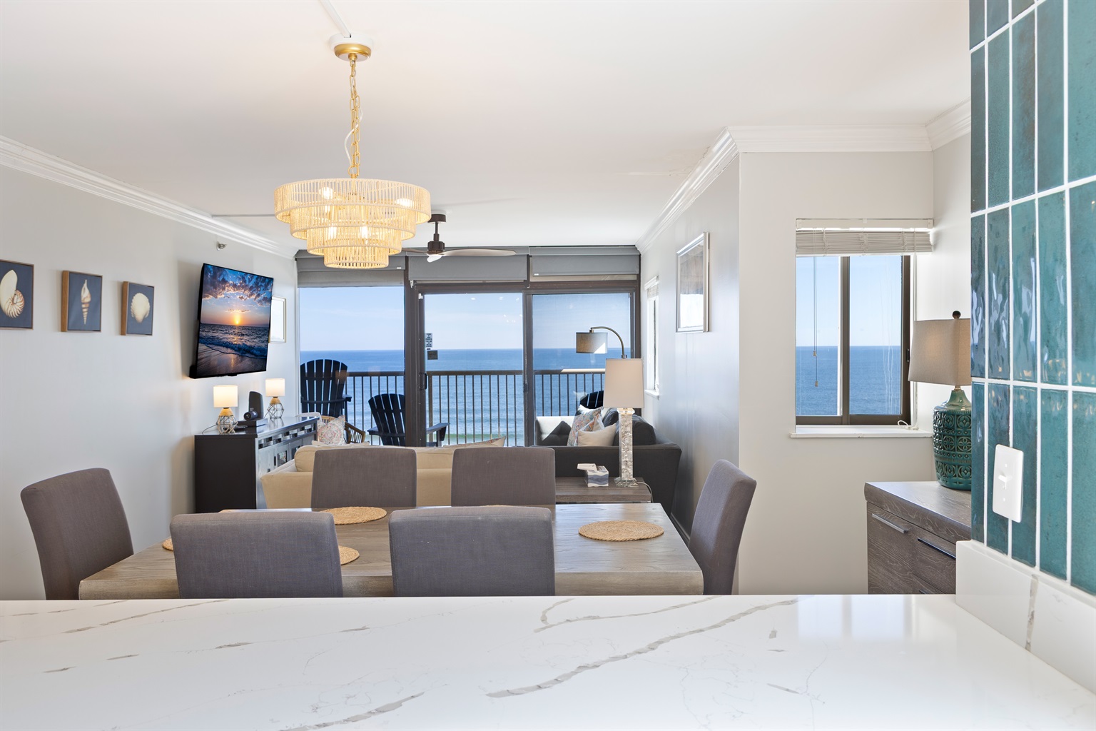 Dining room table with seating for 6 as well as seating for 4 at the kitchen bar