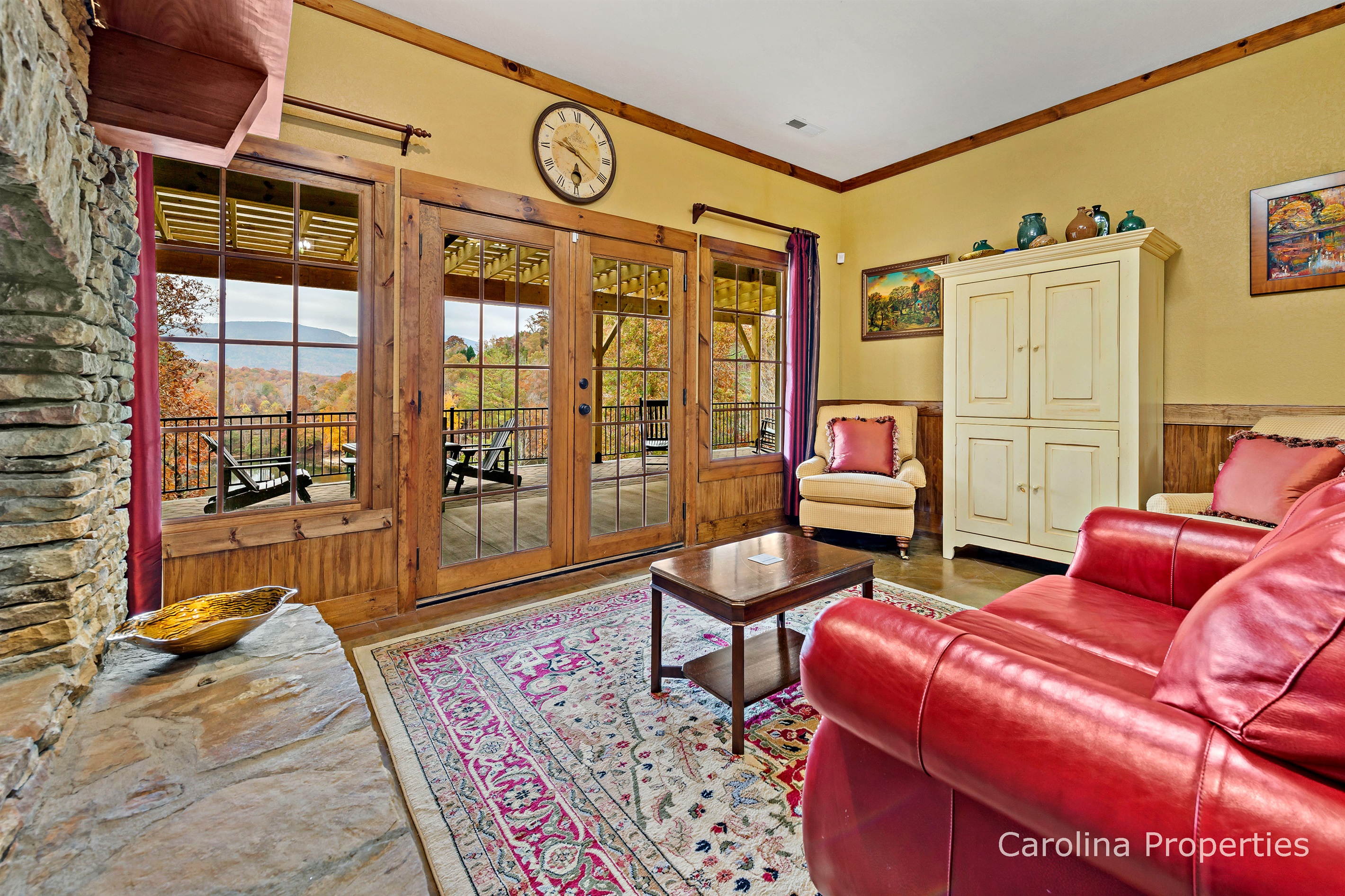 French doors lead outside to the lower level deck