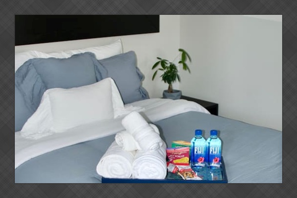 Comfortable bedroom with soft bedding and relaxing atmosphere.