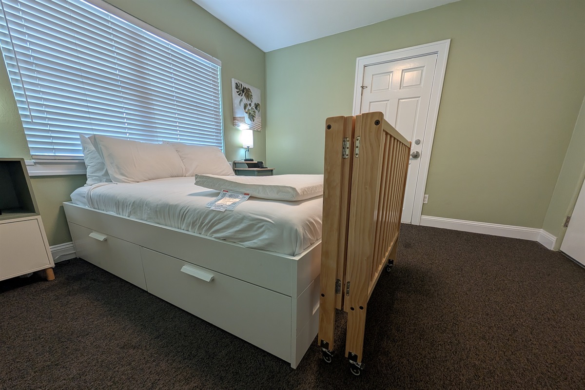Foldable crib is located in the master closet.