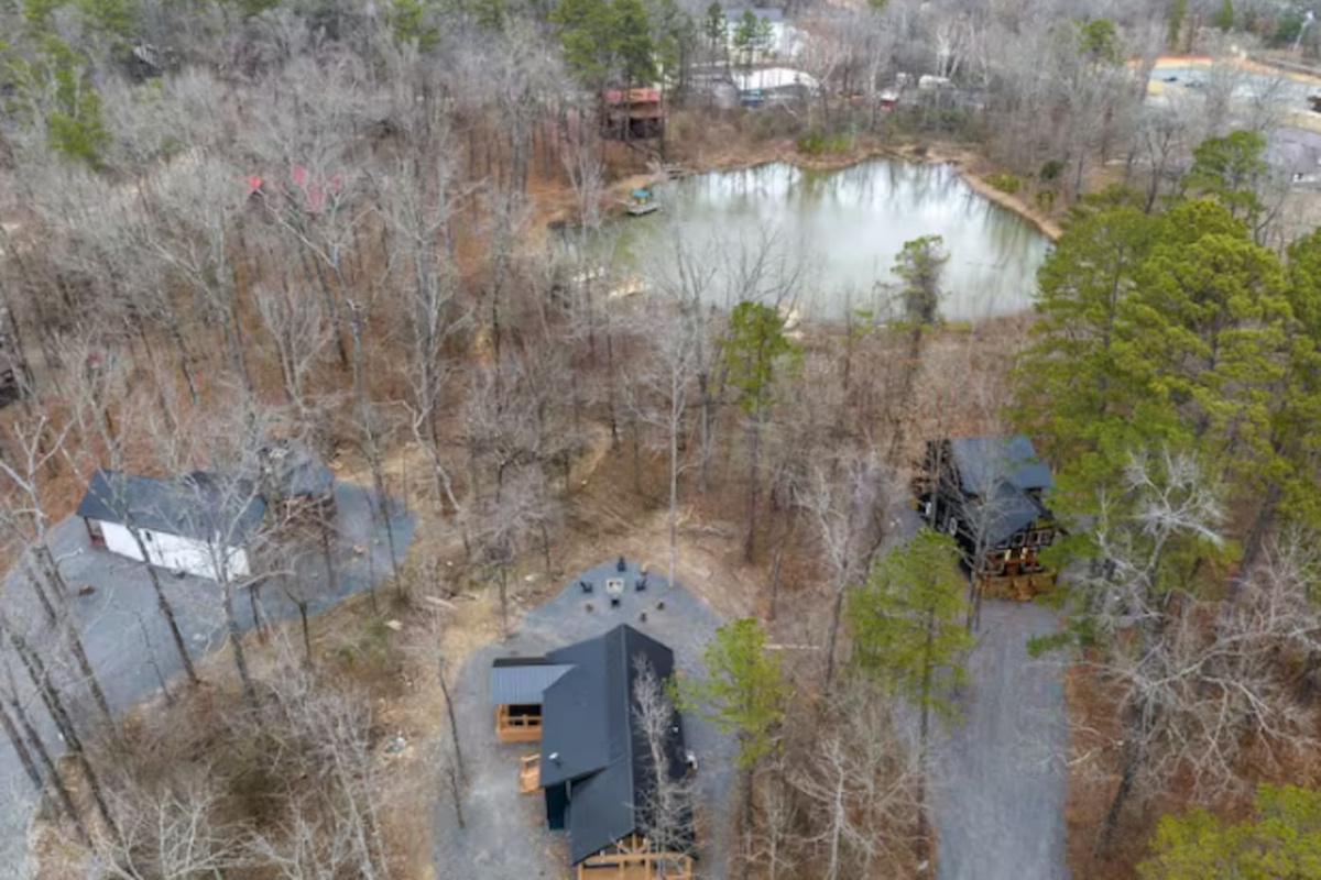 Bird’s-eye view of the cabin and nearby pond