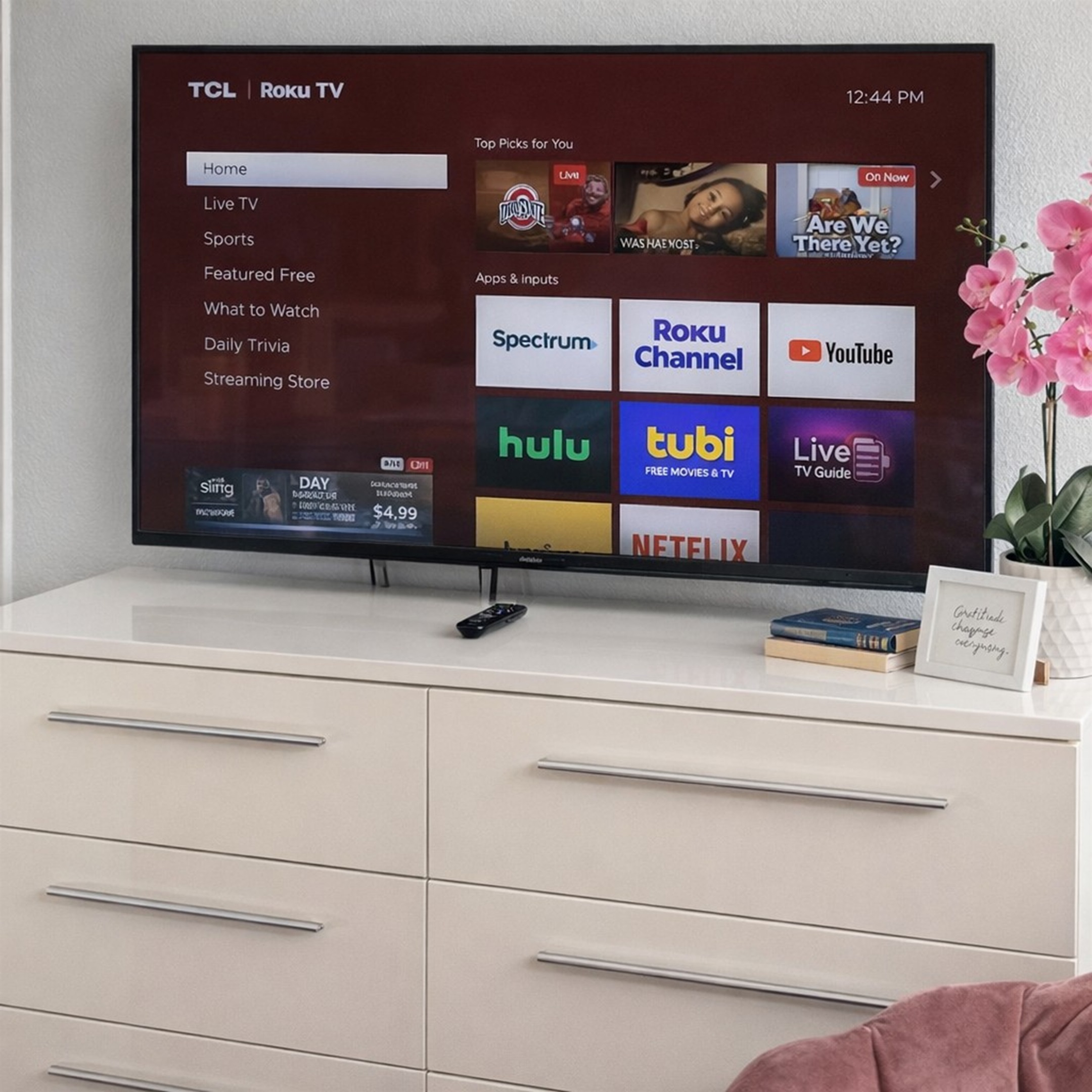 Modern dresser with a large smart TV offering multiple streaming options