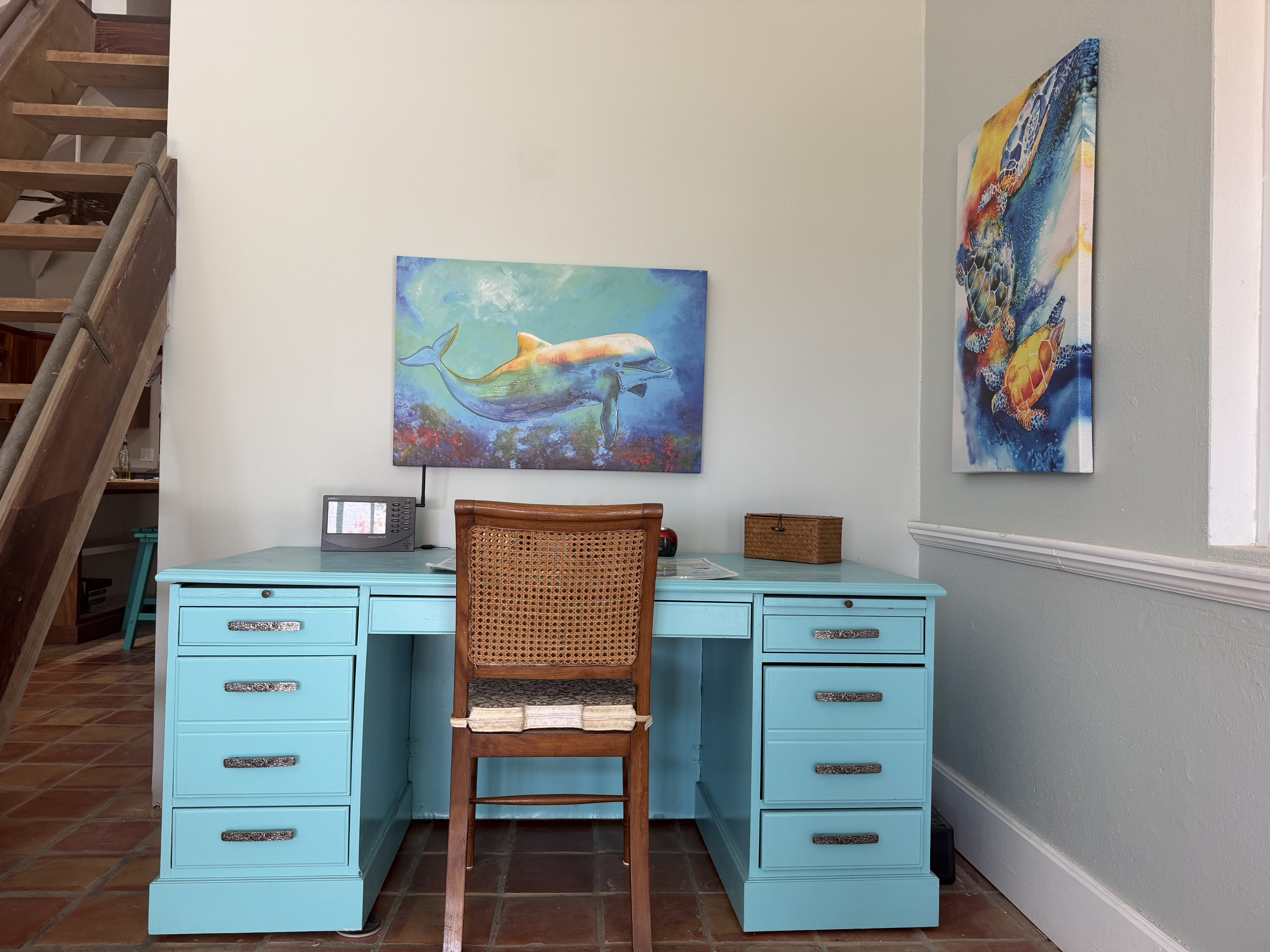 Need to check emails or stay productive while away? This dedicated workspace combines practical remote-work functionality with coastal charm.