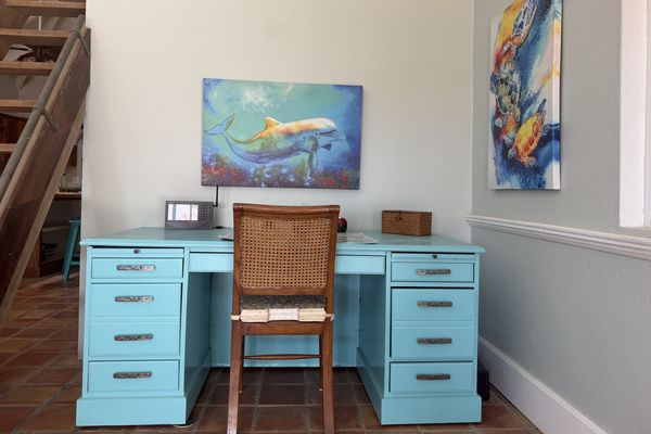 Need to check emails or stay productive while away? This dedicated workspace combines practical remote-work functionality with coastal charm.