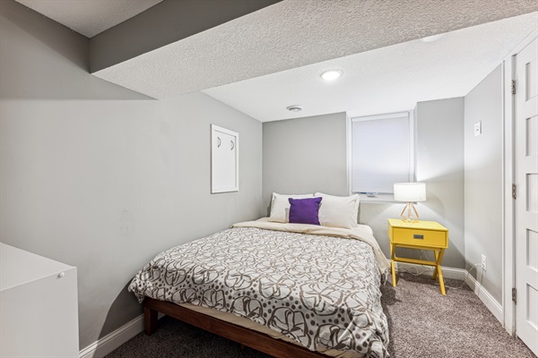 Basement queen bedroom off of family room