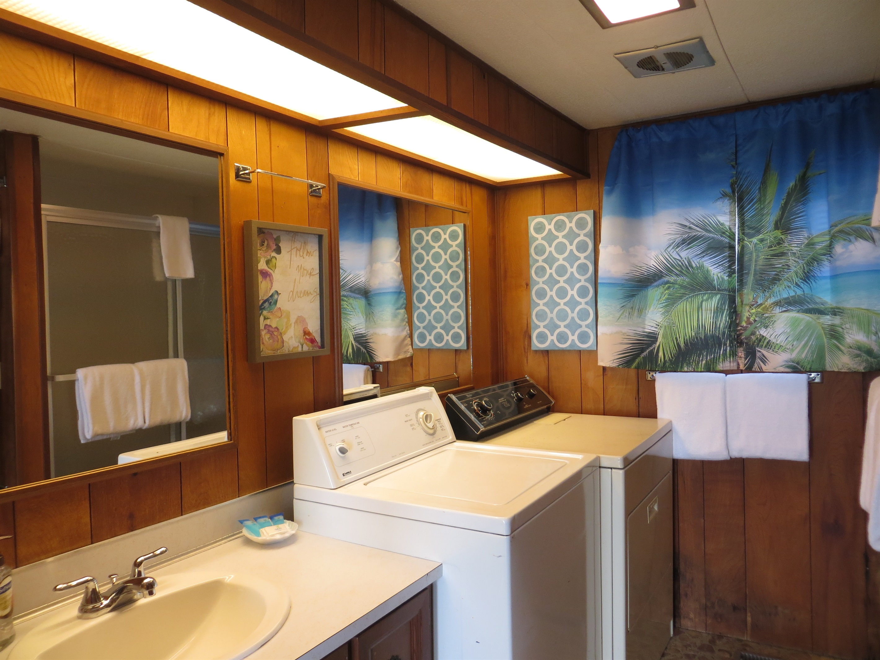 bathroom with shower/tub combo & Laundry