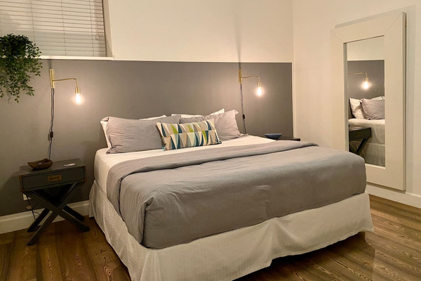 The master bedroom 
Has easy access to the bed.