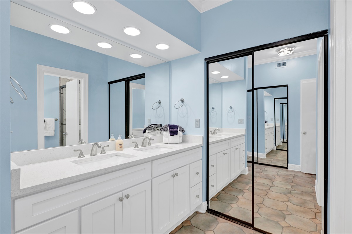 Dressing area with solid wood cabinet, quartz counter top and 2 sinks