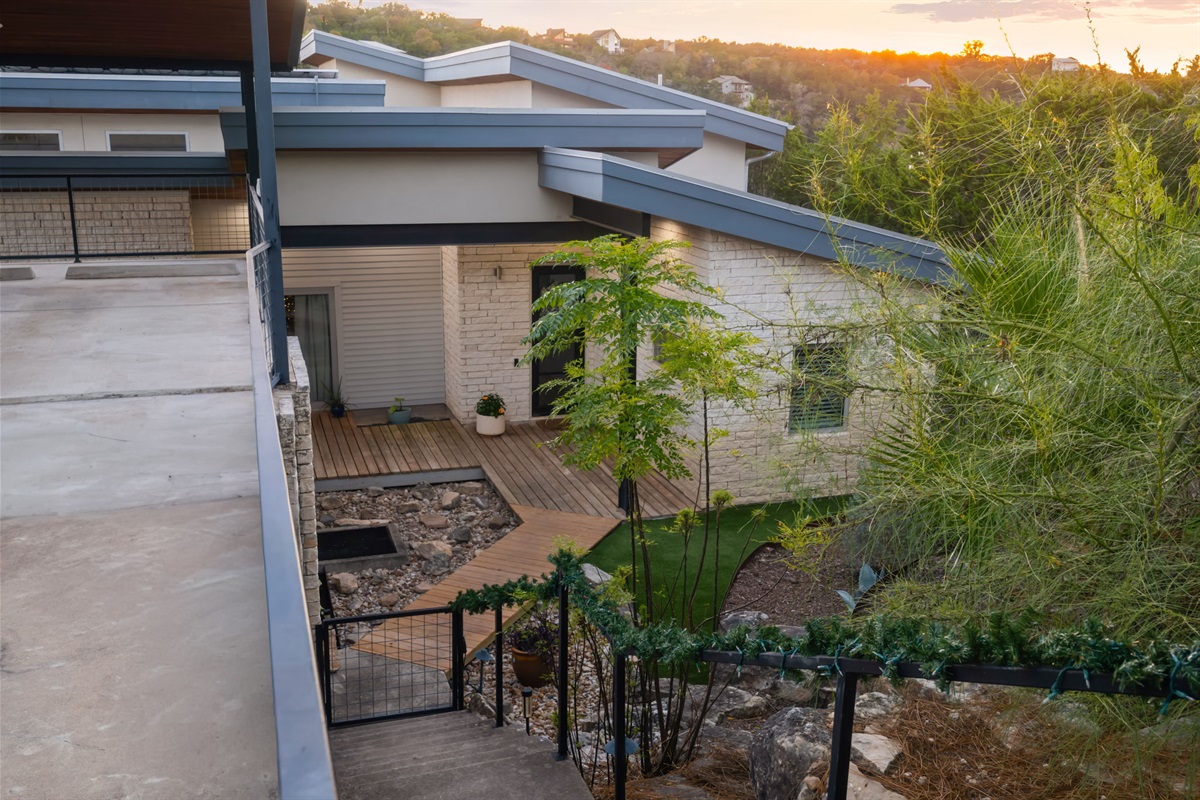 Elevated outdoor area with modern architecture and landscaping