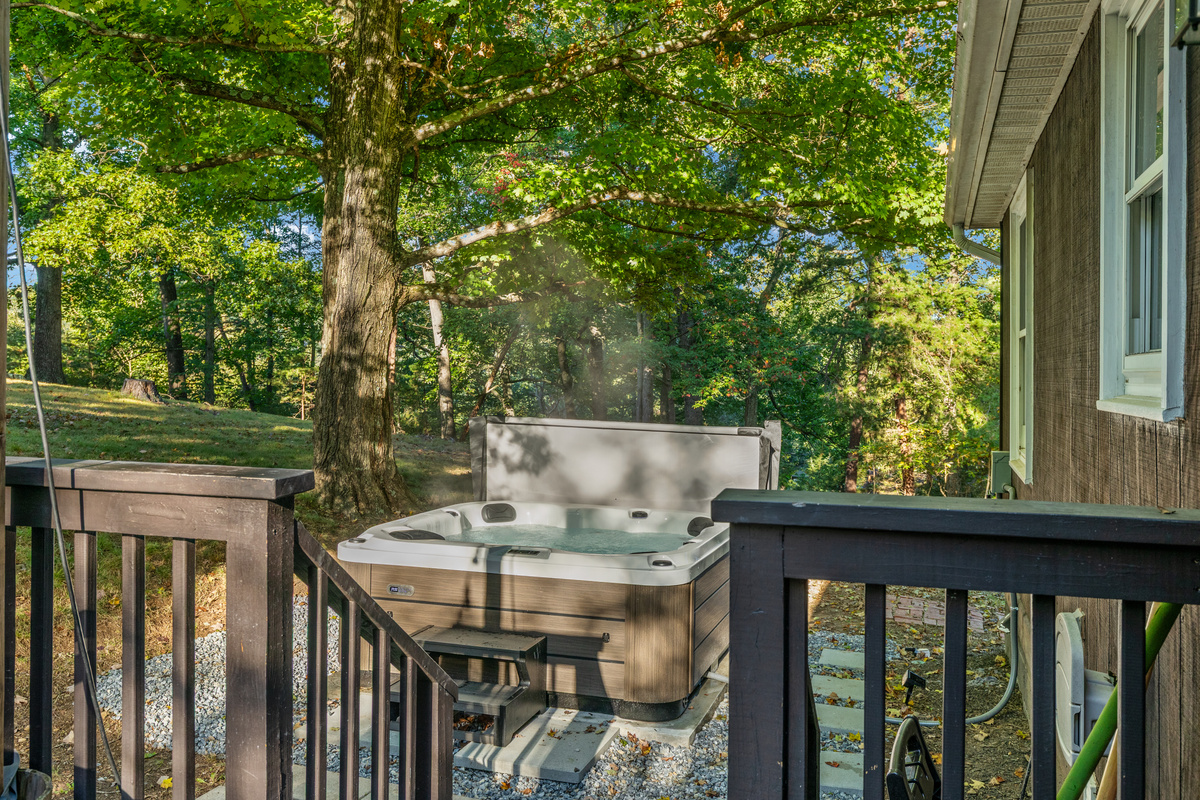 The relaxing hot tub awaits just outside the deck off the kitchen
