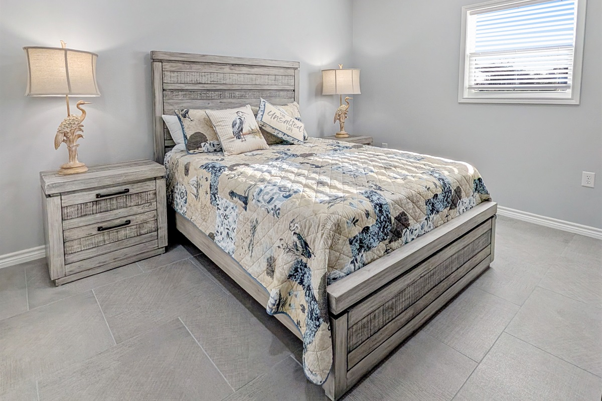 Bedroom 4 offers a queen bed and smart tv