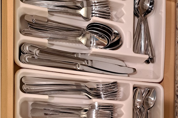 Lots of eating utensils