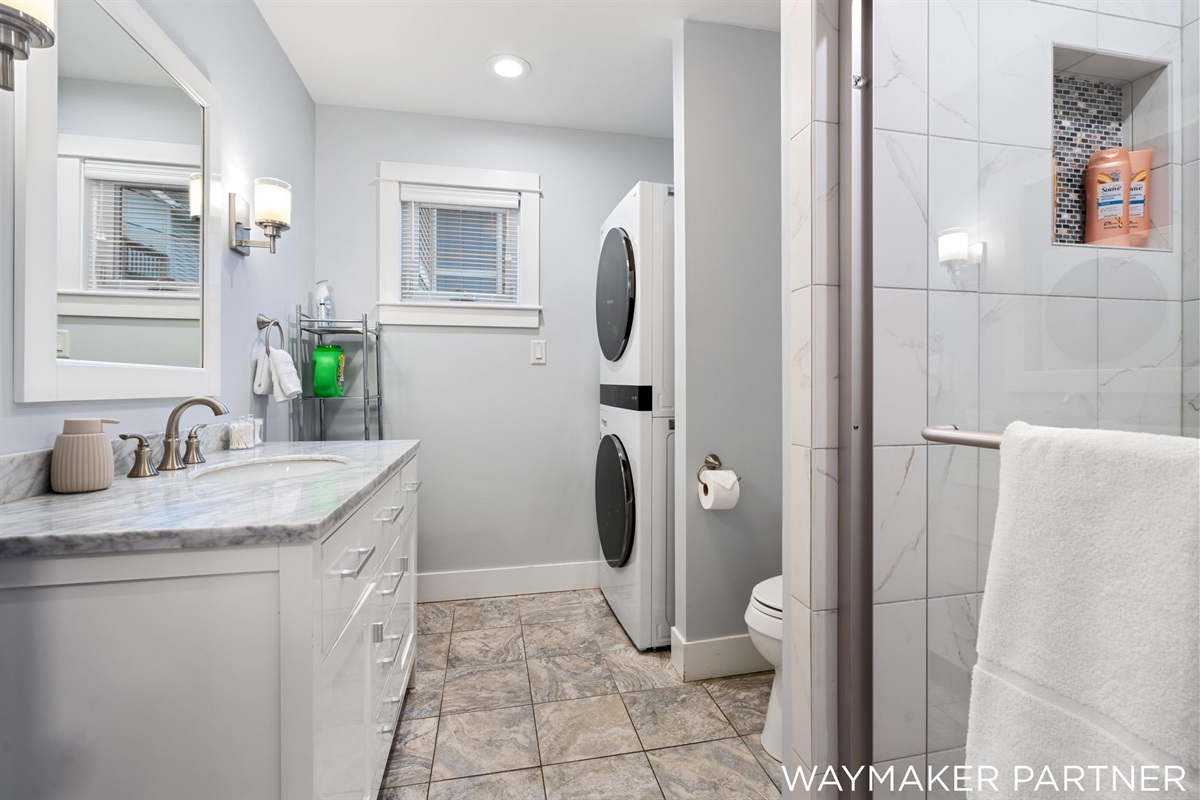 Bathroom #2 has a washer and dryer