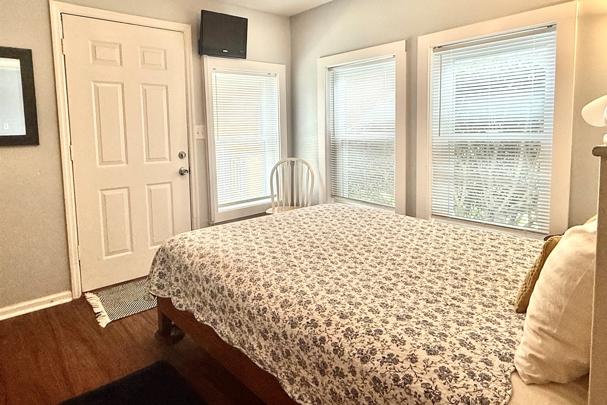Bedroom 2 has the best windows AND an exterior door for more light and access.
