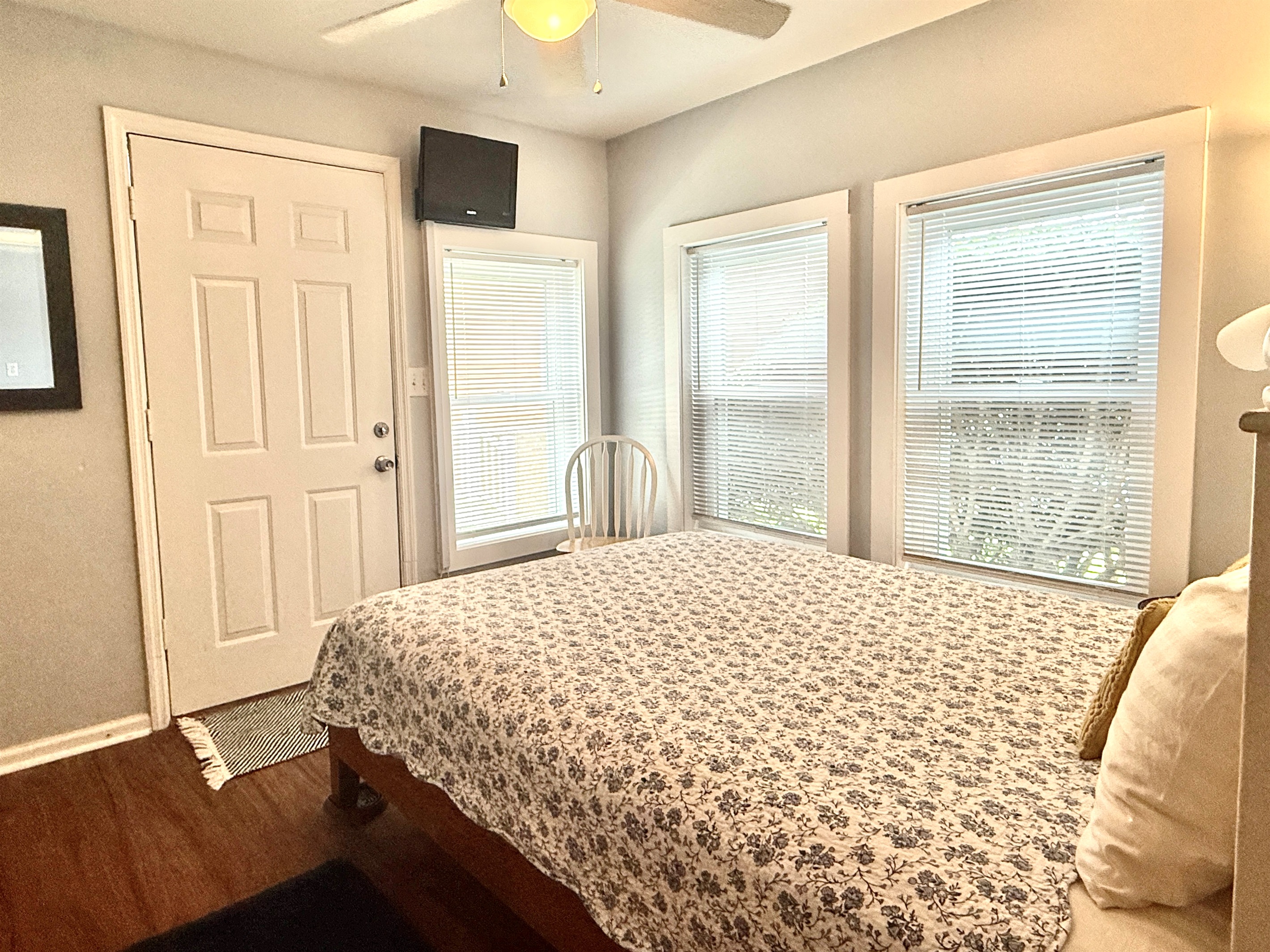 Bedroom 2 has the best windows AND an exterior door for more light and access.