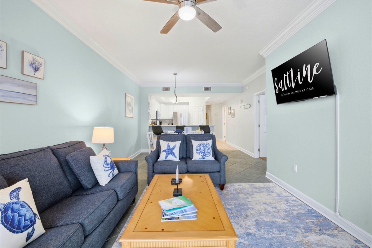 With plenty of seating and a welcoming coastal feel, this living space is made for easy vacation evenings together.