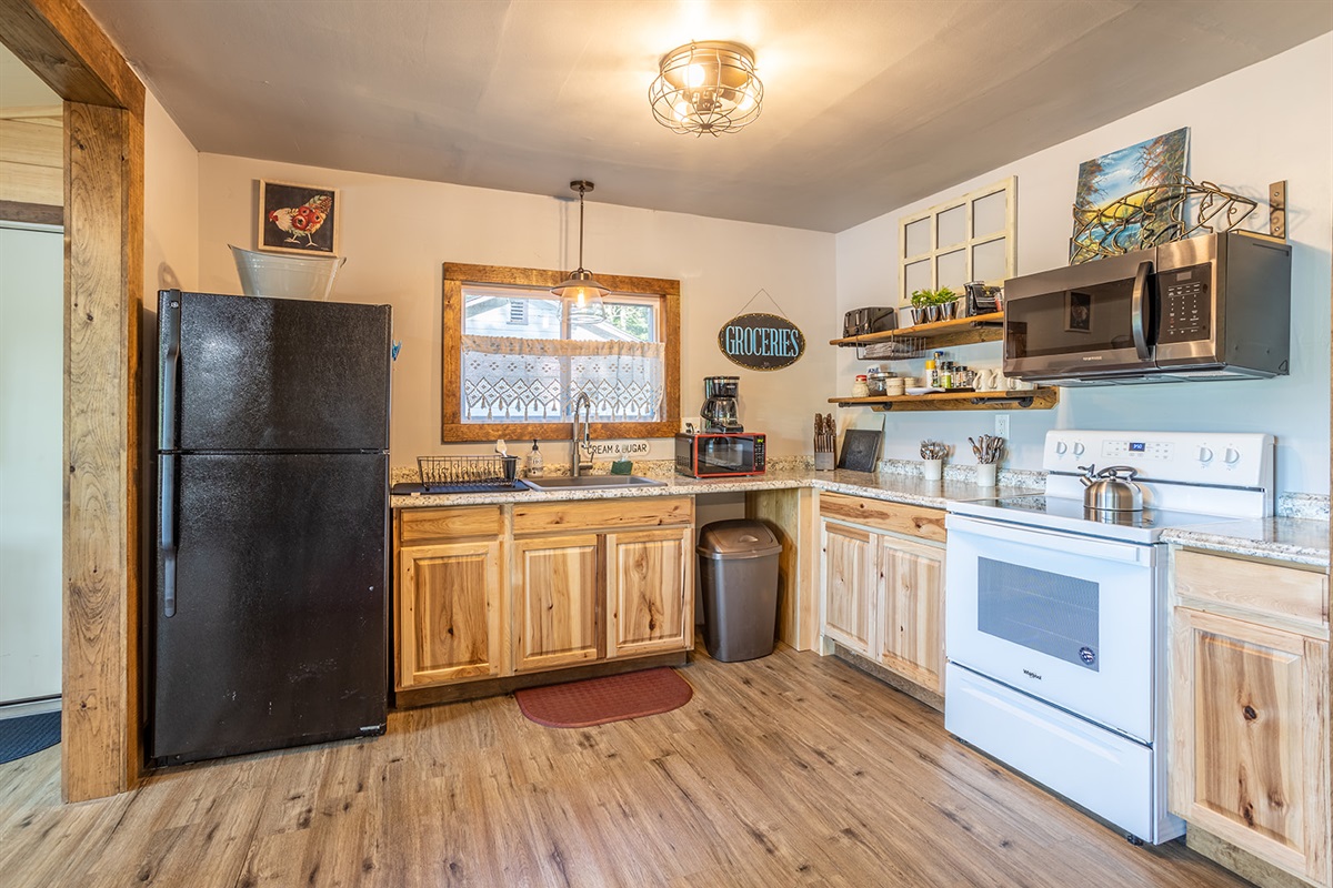 All the staples are provided in this fully equipped kitchen. **Dishwasher installed post photo! ;)