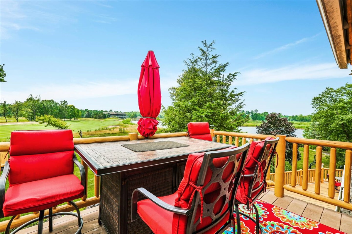 Walk out from the kitchen to the large wrap around deck.