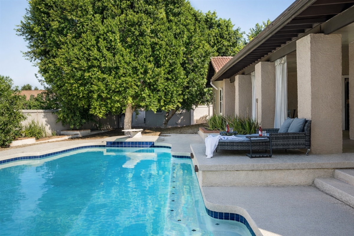 Unwind by the heated pool with plush seating and total privacy for the perfect desert getaway.