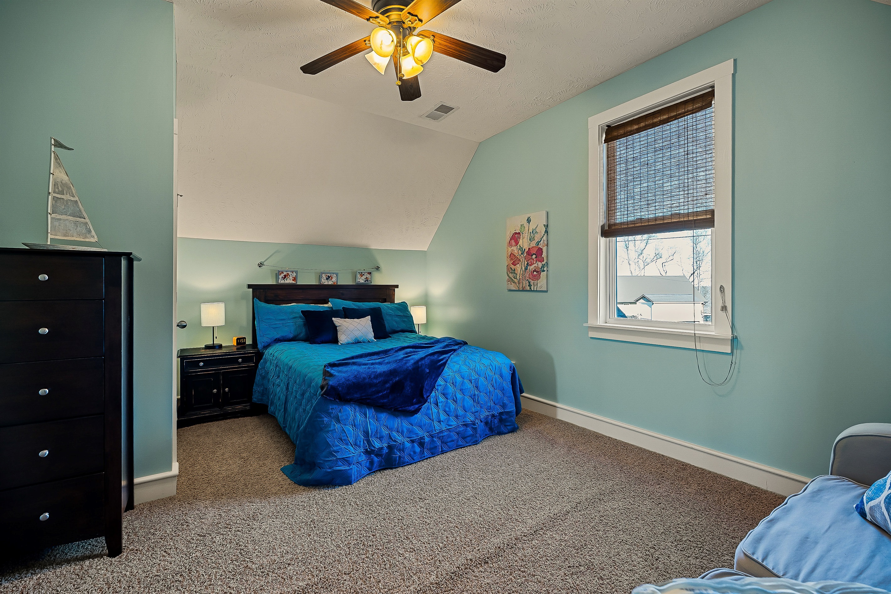 Front bedroom with sofa and large closet