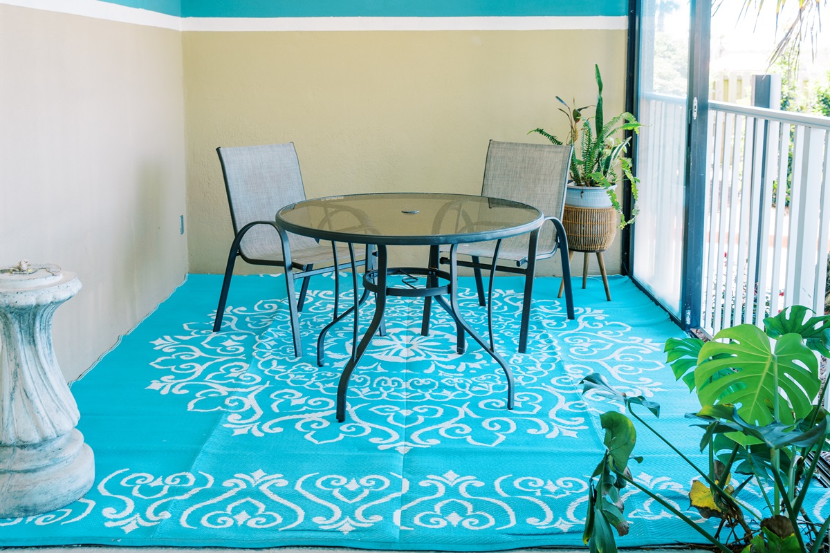 Additional seating around the indoor atrium pool.