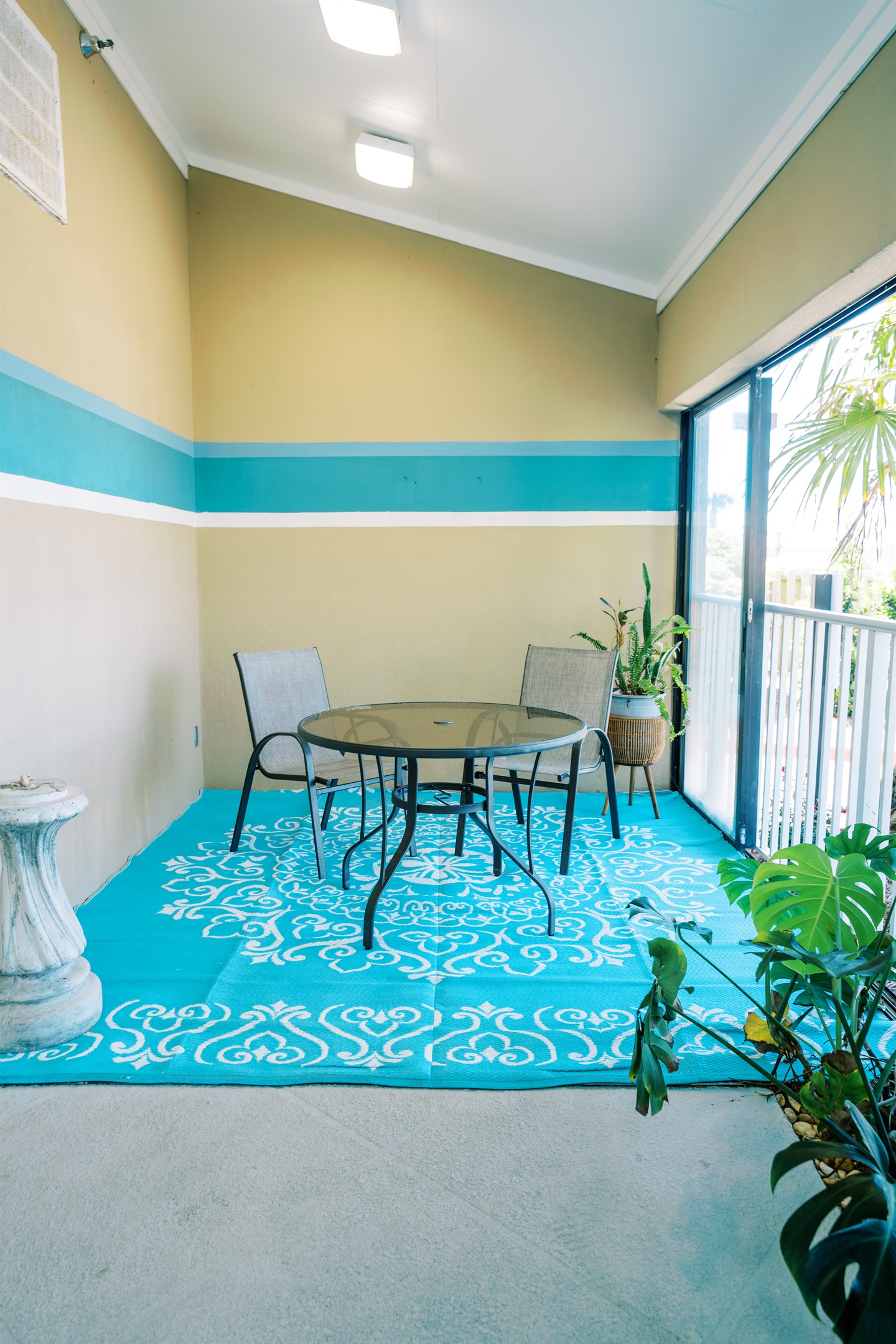 Additional seating around the indoor atrium pool.