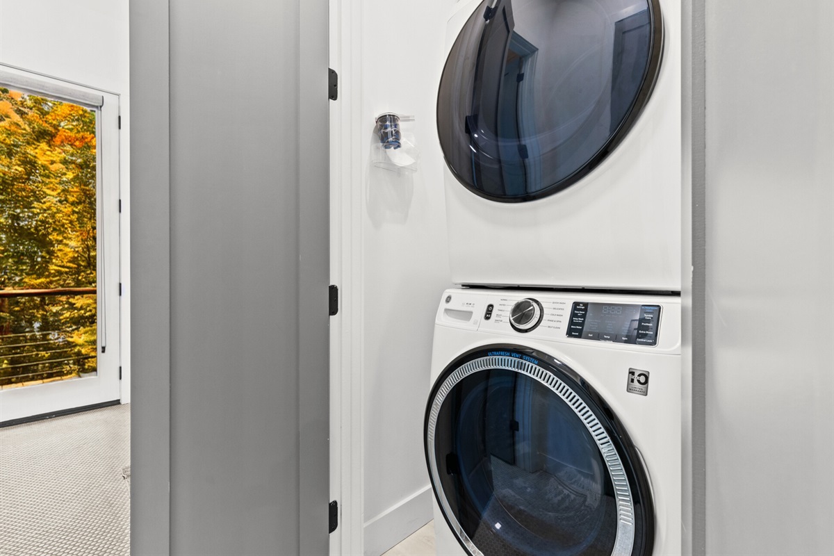 A laundry room equipped with a washer and dryer, making it easy to keep everything fresh during your stay.