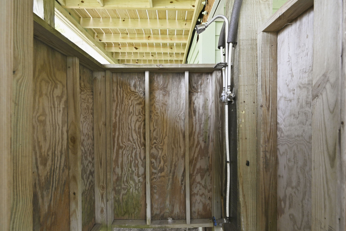 Private outdoor shower with hot and cold water, making beach clean-up quick and easy